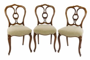 A Set of Six Walnut Baloon Back Chairs by Gillows