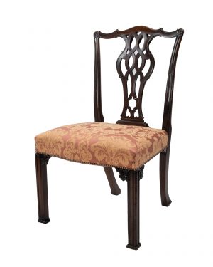 A Set of Four Carved Mahogany Chippendale Style Dining Chairs With Carved Splats by Gillows